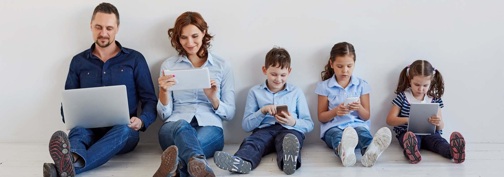 family with internet devices